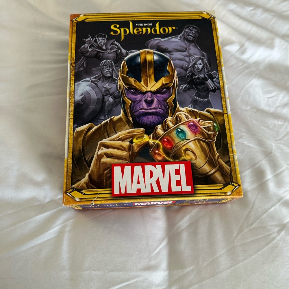 Marvel Infinity Quest Game with Gold and Purple Accents